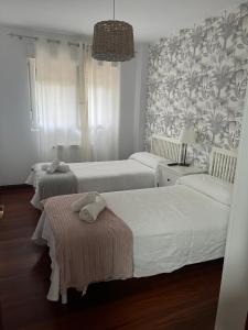 Postel nebo postele na pokoji v ubytování LOS ÁLAMOS