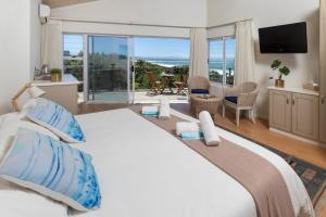 En eller flere senge i et værelse på African Perfection 2