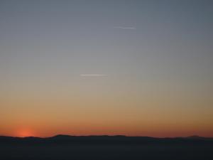 The sunrise or sunset as seen from a vidéki vendégházakat or nearby