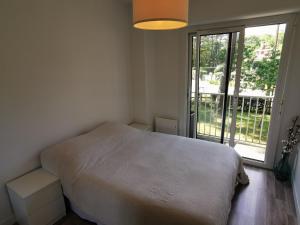 Posteľ alebo postele v izbe v ubytovaní Résidence ORION- Appartement pour 2 à 3 personnes- Wifi gratuit