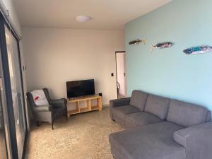 TV o dispositivi per l'intrattenimento presso DieStrandwolf Sea View Self Catering