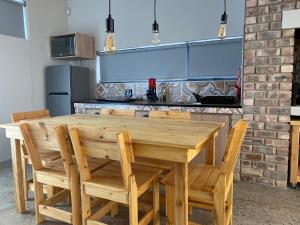 Cucina o angolo cottura di DieStrandwolf Sea View Self Catering