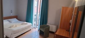Postel nebo postele na pokoji v ubytování Hotel Nuovo Rondò