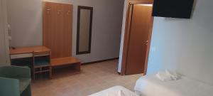 TV a/nebo společenská místnost v ubytování Hotel Nuovo Rondò