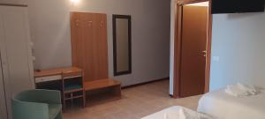 Postel nebo postele na pokoji v ubytování Hotel Nuovo Rondò