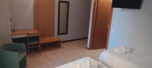 Postel nebo postele na pokoji v ubytování Hotel Nuovo Rondò