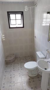 Koupelna v ubytování Maury Chalés Boiçucanga + 64 fotografií