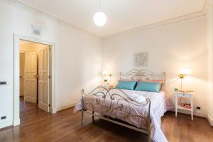 Postel nebo postele na pokoji v ubytování B&B Frida Suite Home