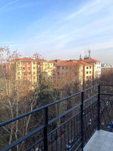 a view of buildings from a balcony at Bilocale moderno - Lorenteggio 145 in Milan