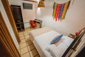 Postel nebo postele na pokoji v ubytování Vilas Insight Hotel Machupicchu