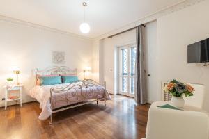 Postel nebo postele na pokoji v ubytování B&B Frida Suite Home