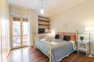 Postel nebo postele na pokoji v ubytování B&B Frida Suite Home
