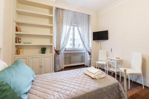Postel nebo postele na pokoji v ubytování B&B Frida Suite Home