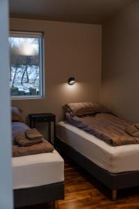 Postel nebo postele na pokoji v ubytování Golden Circle Villa - Hot Tub & Sauna