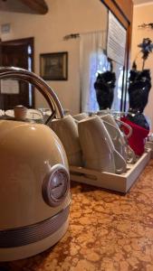 a toaster sitting on top of a counter at La busa camere e trattoria in Ponte San Nicolo