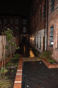 an empty alley in an old building at night at Modern home in Birmingham in Birmingham