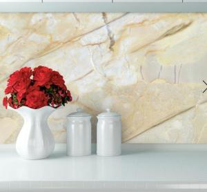 two white candles and a vase with red flowers on a shelf at ESCAL'HOME , appart design au pied de l'aéroport,parkings in Blagnac