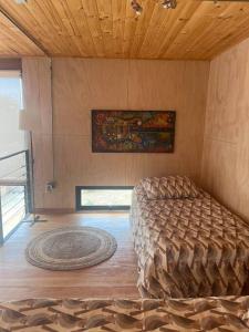 Postel nebo postele na pokoji v ubytování Casa Vaguada Laguna Verde
