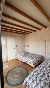 Postel nebo postele na pokoji v ubytování Casa Vaguada Laguna Verde