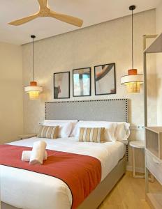 Apartamentos Soho Boutique Palillero客房内的一张或多张床位