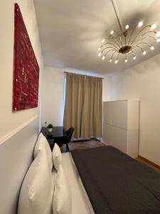 Postel nebo postele na pokoji v ubytování DATRI Petite Suite 1 - 3