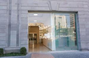 Fațada sau intrarea în Deluxe Modern 1 bedroom Apartment + Balcony, By Republic Square, Middle of City Center