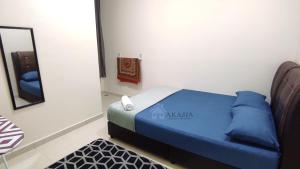 Katil atau katil-katil dalam bilik di Akasia Homestay Kuantan