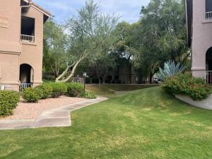 a walkway in a yard next to a building at Scottsdale Retreat in Scottsdale