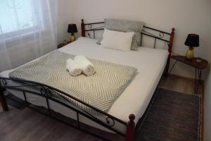 Postel nebo postele na pokoji v ubytování Apartmán Šurany