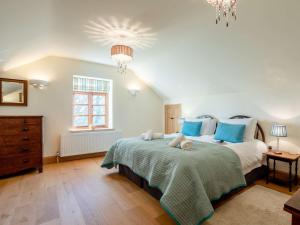 En eller flere senge i et værelse på 1 Bed in Somerton 41734