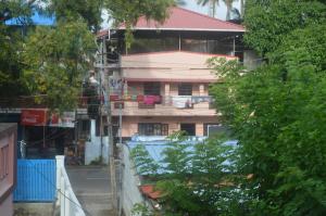 En balkong eller terrasse på The Pod Cochin Homestay