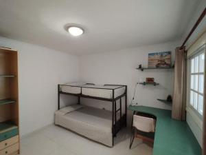 Postel nebo postele na pokoji v ubytování Tango House