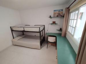 Postel nebo postele na pokoji v ubytování Tango House