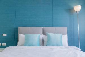 Een bed of bedden in een kamer bij 沙沙民宿