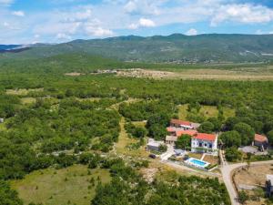 an aerial view of a house with a yard at Kuća za odmor Silvano in Dicmo