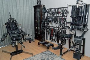 a room filled with lots of tools on a wall at Alba Domina Apartment - BDSM Fetish Domina Studio in Székesfehérvár