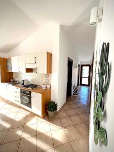 Kuchyňa alebo kuchynka v ubytovaní Casa Carmen - Attico vista mare