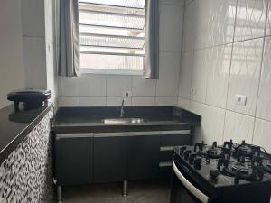 Photo de la galerie de l'établissement Kitnet, à Praia Grande