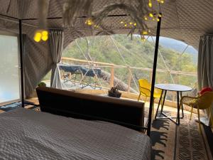 Postel nebo postele na pokoji v ubytování Mountain view Dome- 10 Minutes to National Park