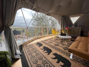 Posezení v ubytování Mountain view Dome- 10 Minutes to National Park + 10 fotografií