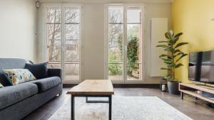 Χώρος καθιστικού στο Appartement Spacieux - Disney