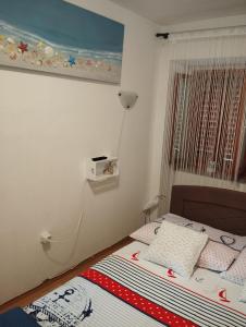 Ein Bett oder Betten in einem Zimmer der Unterkunft ANCHOR BAŠKA