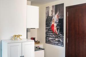 Kuchyň nebo kuchyňský kout v ubytování Studio Mignon proche de Paris et Disneyland