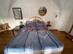 Ein Bett oder Betten in einem Zimmer der Unterkunft Casetta zia Tetti