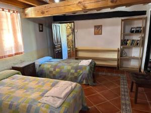 Postel nebo postele na pokoji v ubytování Casa Rural El Reloj + 35 fotografií
