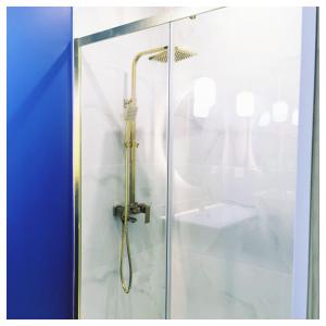 a shower with a glass door with a sink at Chalet Coté Cour à 10 min de la Station in Oz
