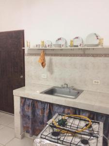 a kitchen with a sink and a counter top at yayaya coronado playa exelente precio in Playa Coronado