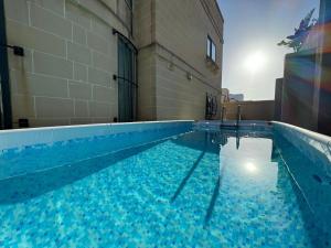 The swimming pool at or close to BaySide1 Marsaxlokk Malta