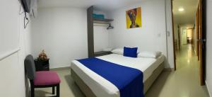 Postel nebo postele na pokoji v ubytování Hotel ITACO