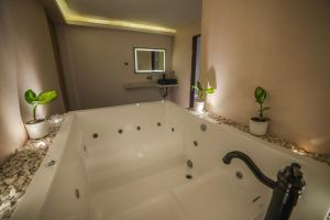 Koupelna v ubytování HOTEL BALI AT POBLADO